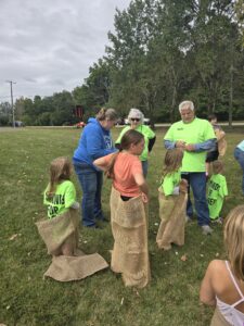 Potato sack races at the Wadsworth Anniversary party